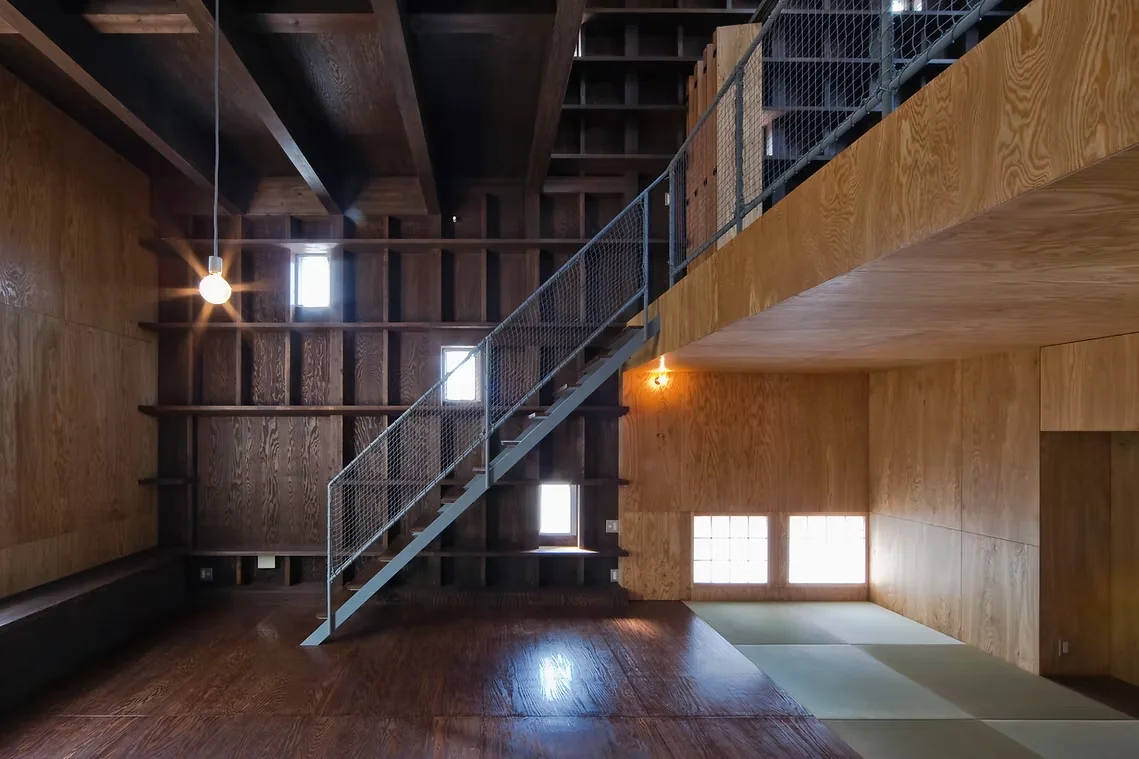 Expansive built-in bookshelves along the east and west walls accentuate intellect and individuality
