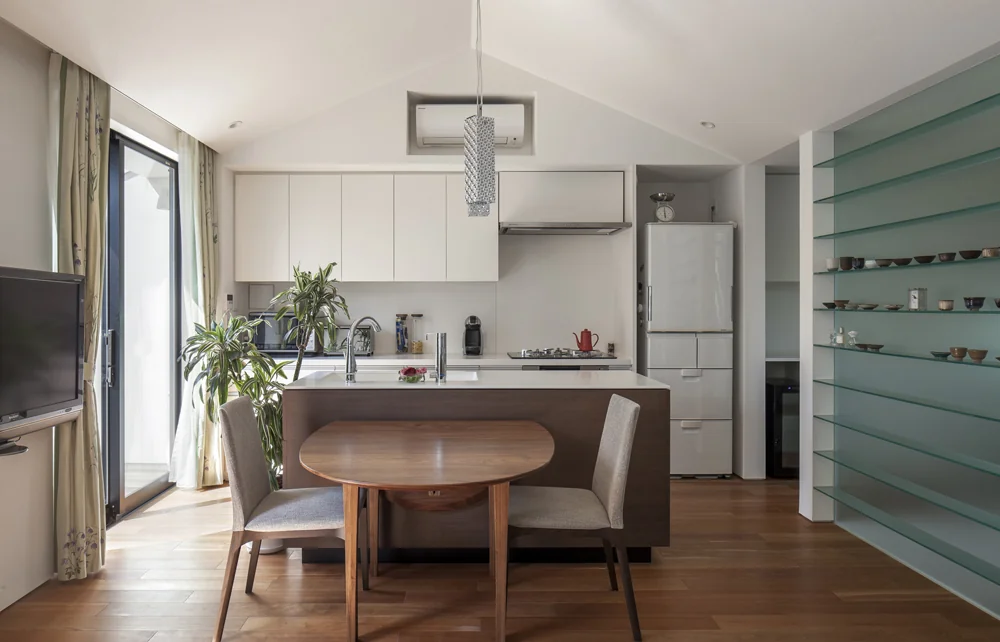 The dining table is a custom original piece.
