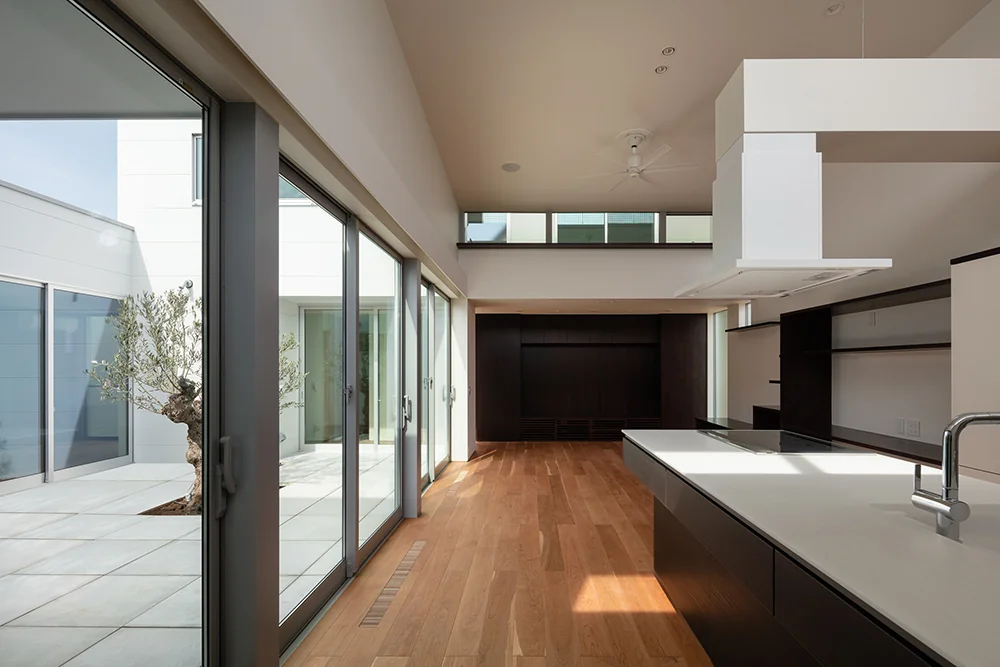 The living-dining-kitchen (LDK) faces the expansive courtyard.