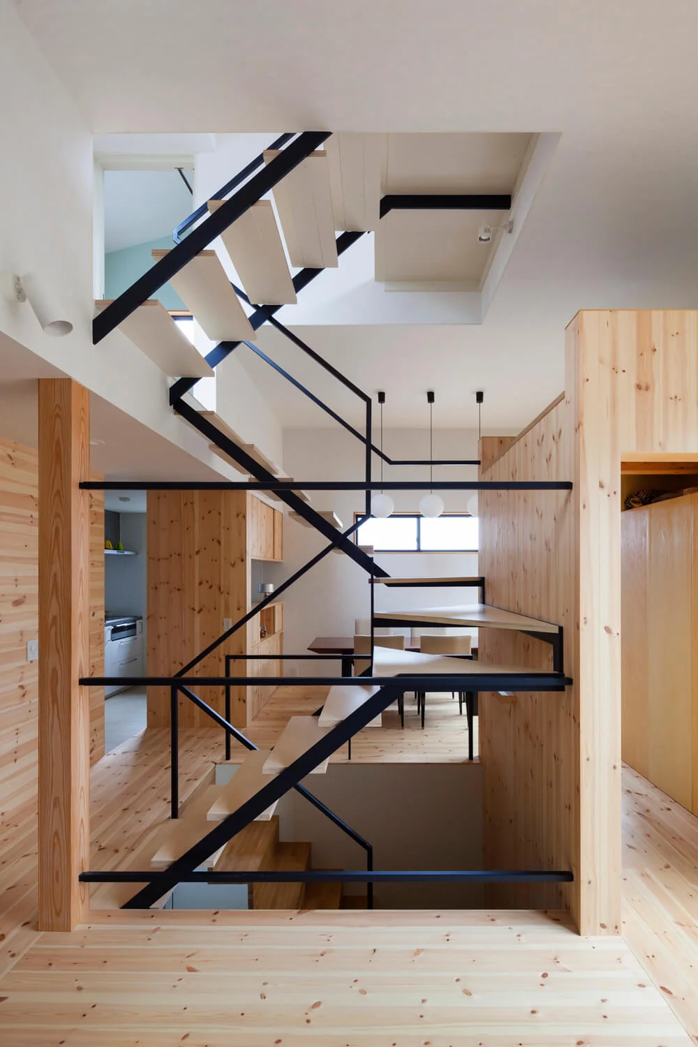 Skeleton staircase featuring treads made from Russian birch laminated plywood
