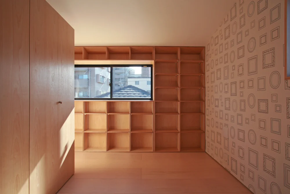 Each room features a wall adorned with wallpaper personally selected by the occupants