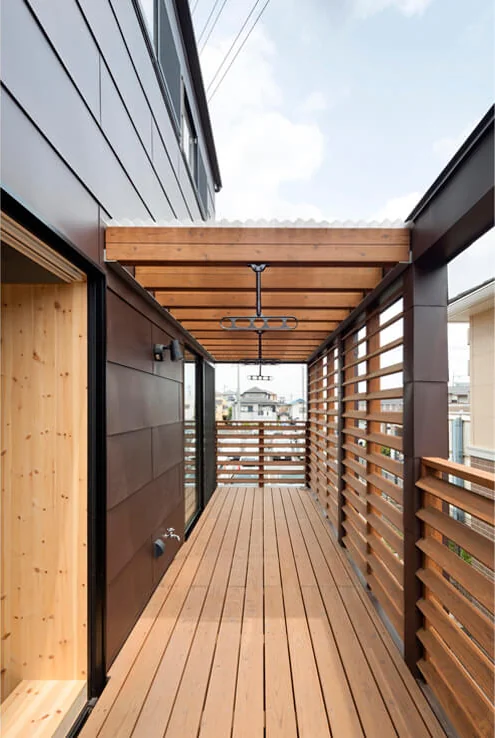Part of the terrace is covered with a roof, serving as a drying area