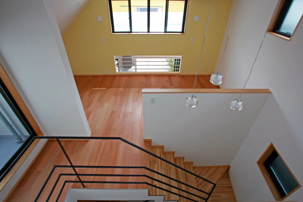From the loft at the building's highest point, there is an unobstructed view down to the deck terrace below.