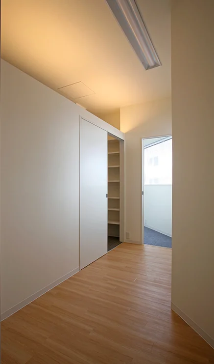 View of entrances to Consultation Room 1 and the director’s office from the staff’s back corridor