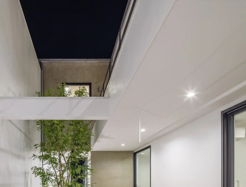 The courtyard adjacent to the first-floor bedroom welcomes fresh morning air and cool evening breezes