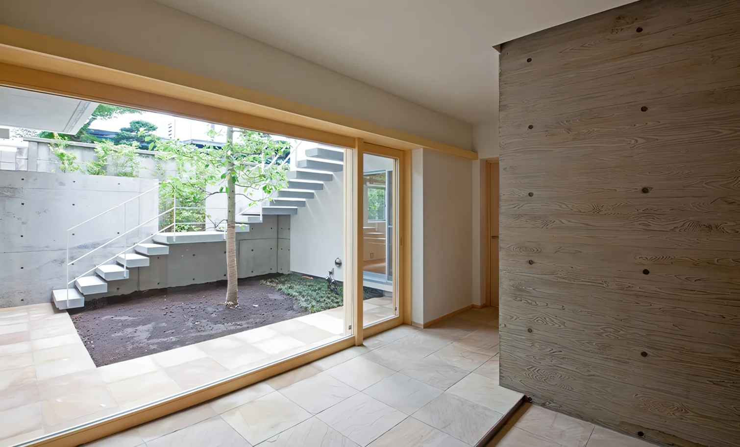 The courtyard comes into view upon opening the entrance door