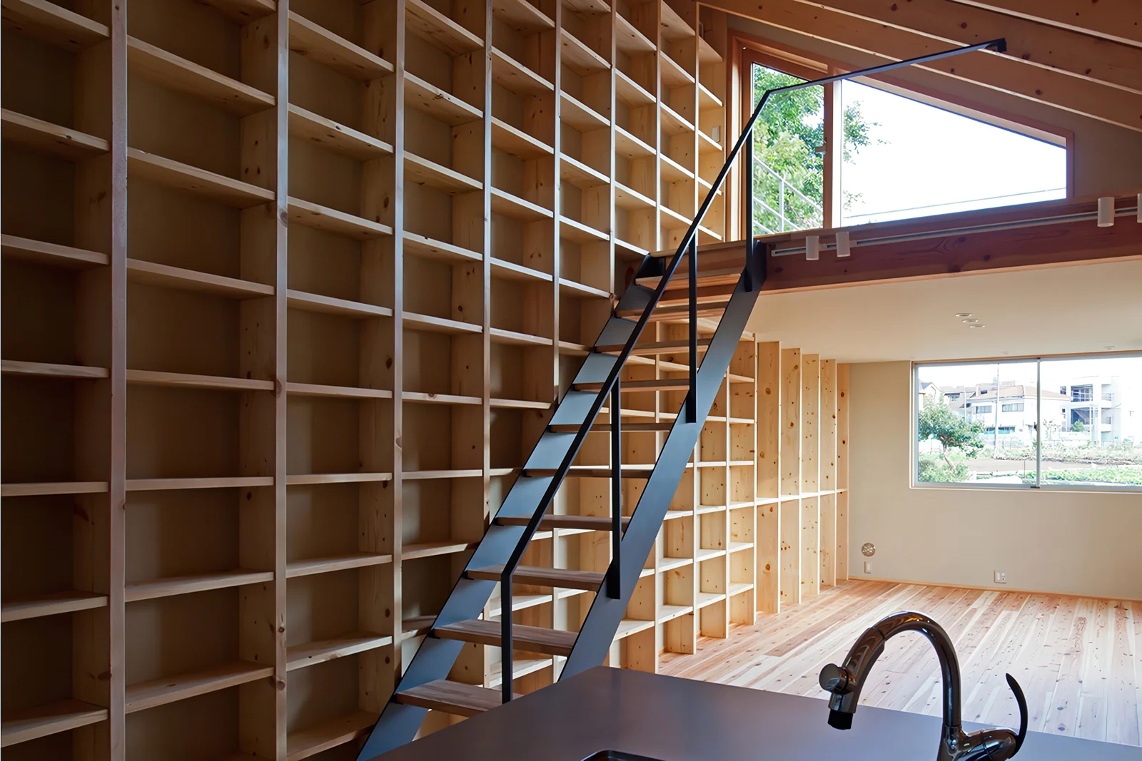 A bookshelf spanning the entire wall surface