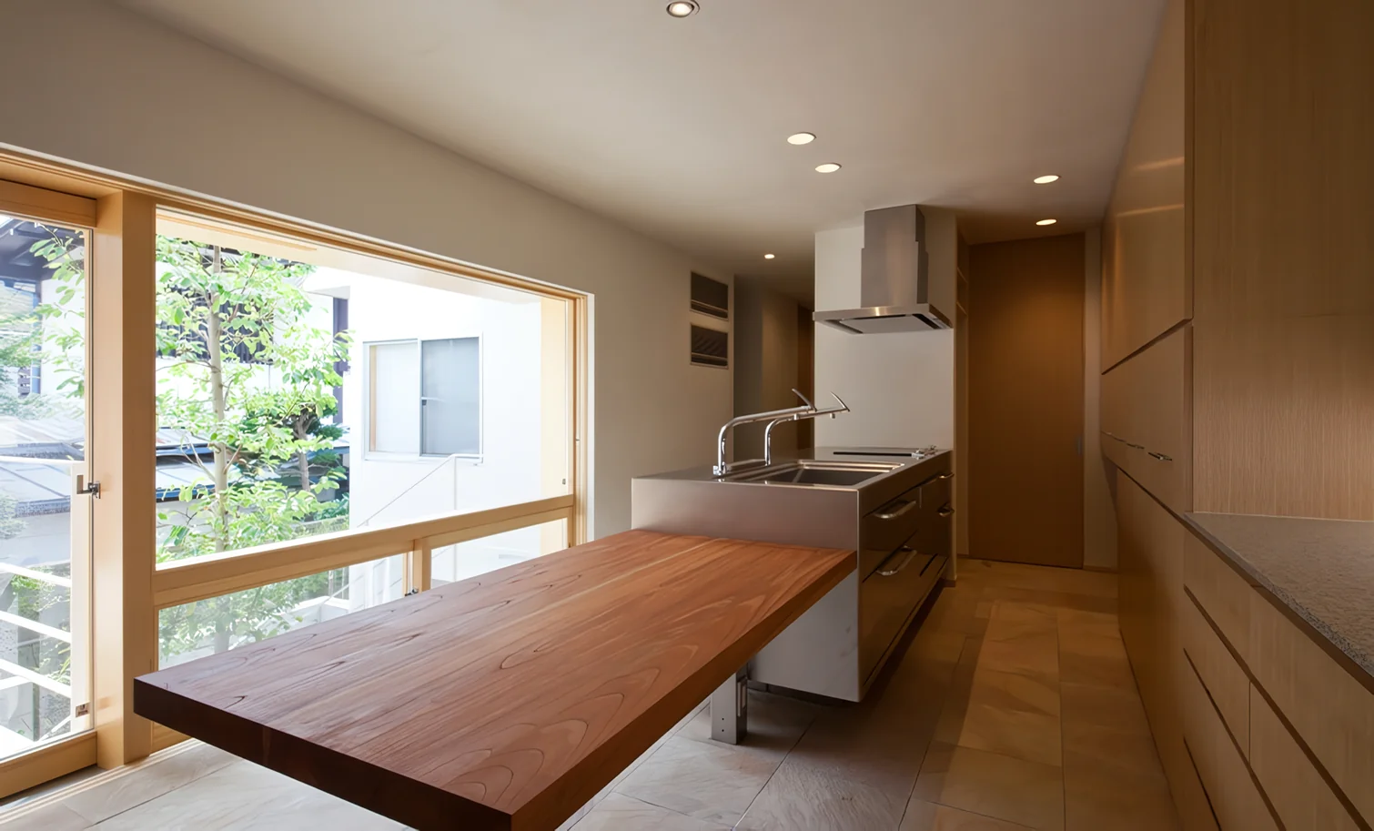 Household chores can be done while enjoying the view of the courtyard with its iconic symbol tree.