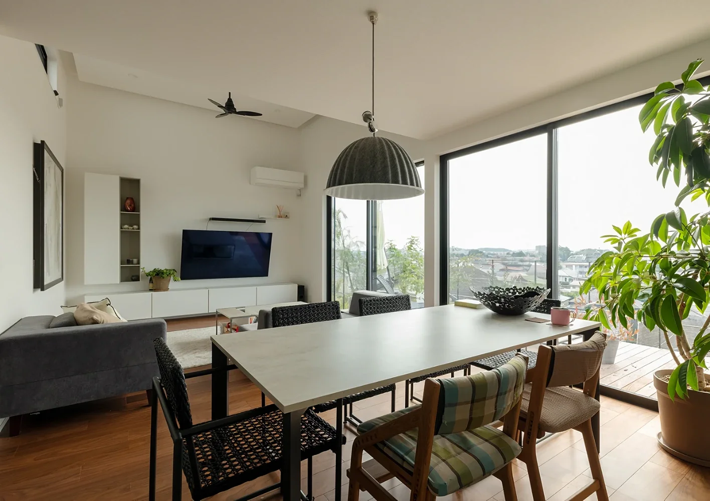 A House with a Deck Opening onto the View