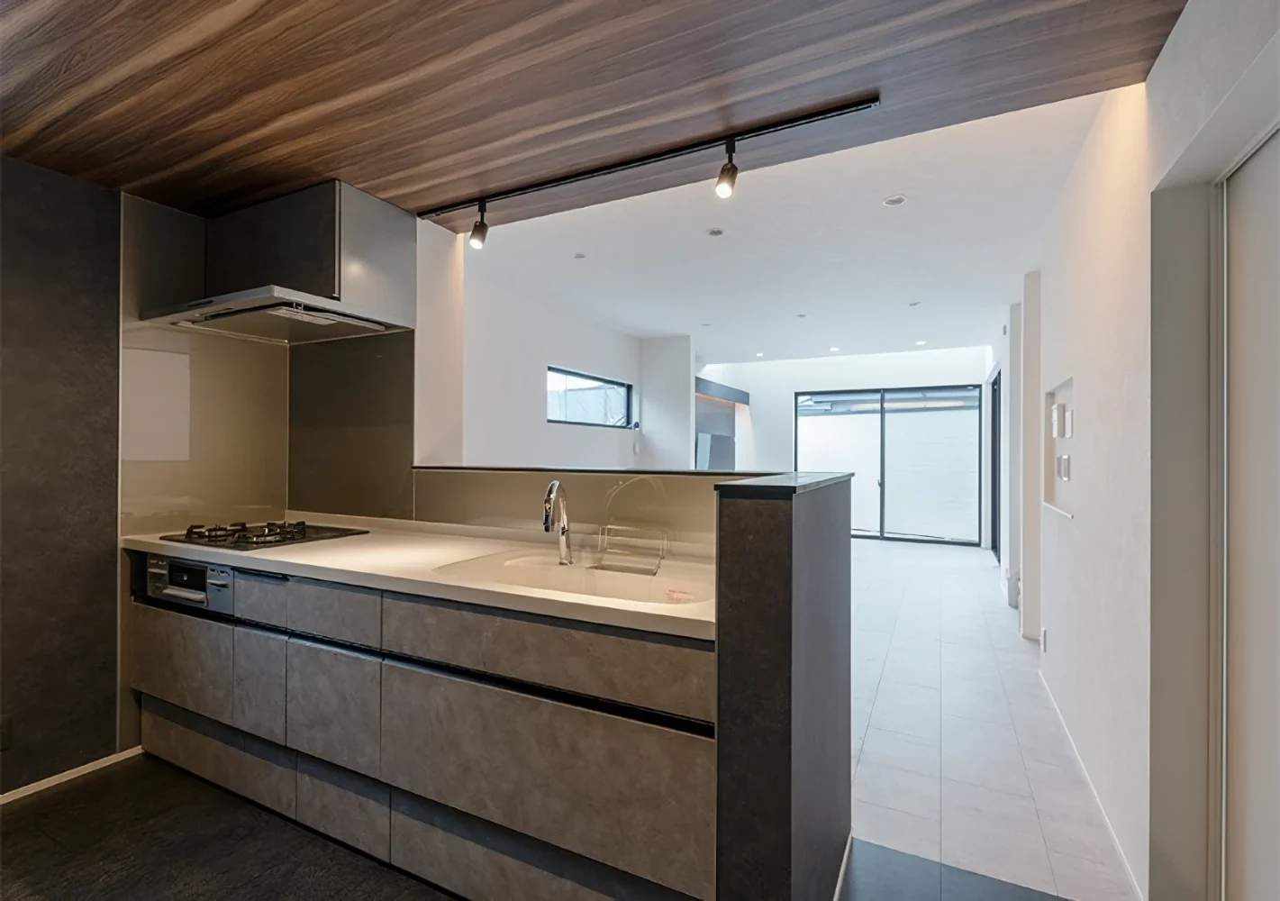 A House Opening Inward to Light and a Terrace