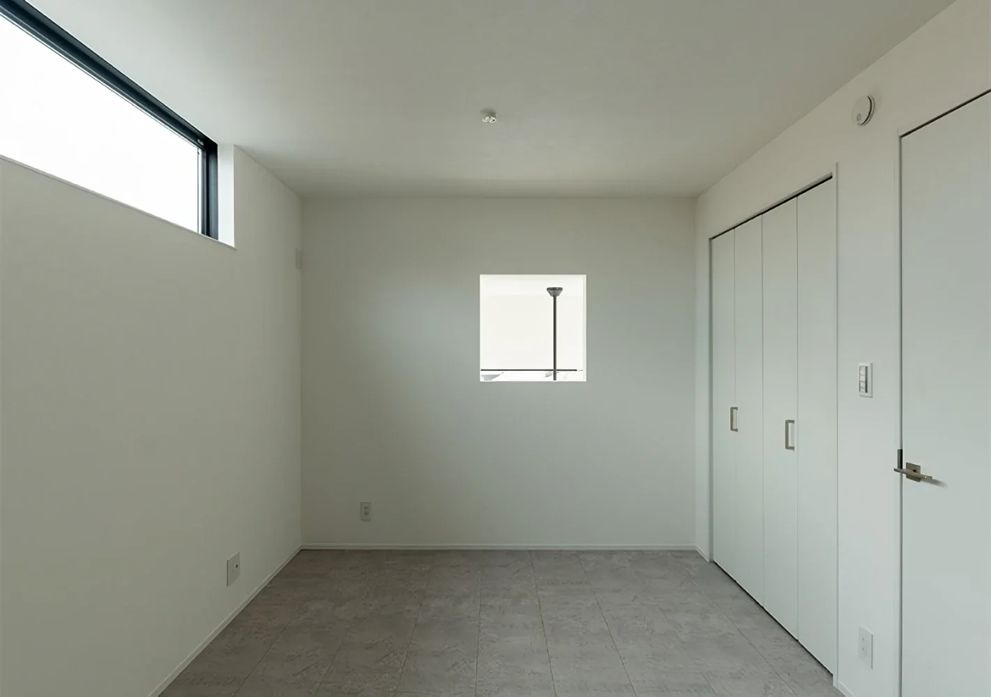 A House Opening Inward to Light and a Terrace