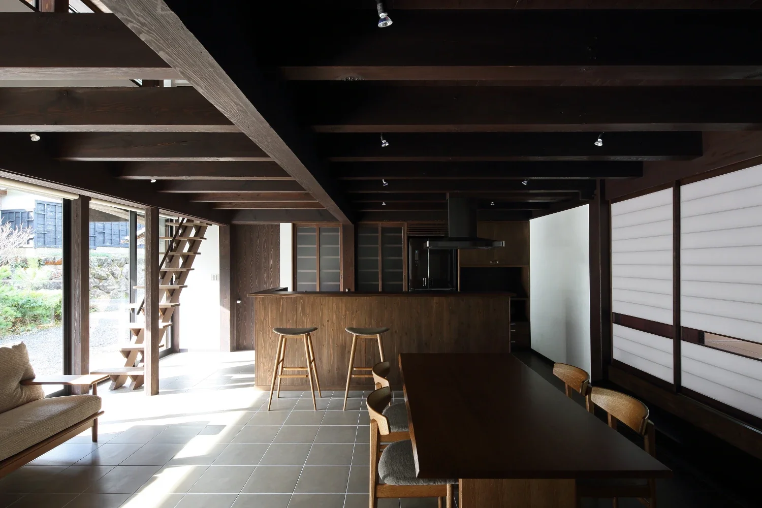 A timber framework was assembled and floored over the former earthen-floored entrance hall, transforming it into an LDK.