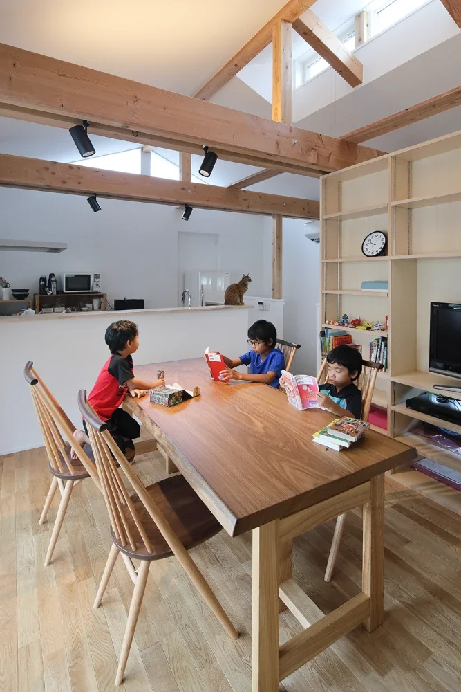 The high ceiling follows the roofline and incorporates clerestory windows for both daylighting and ventilation.