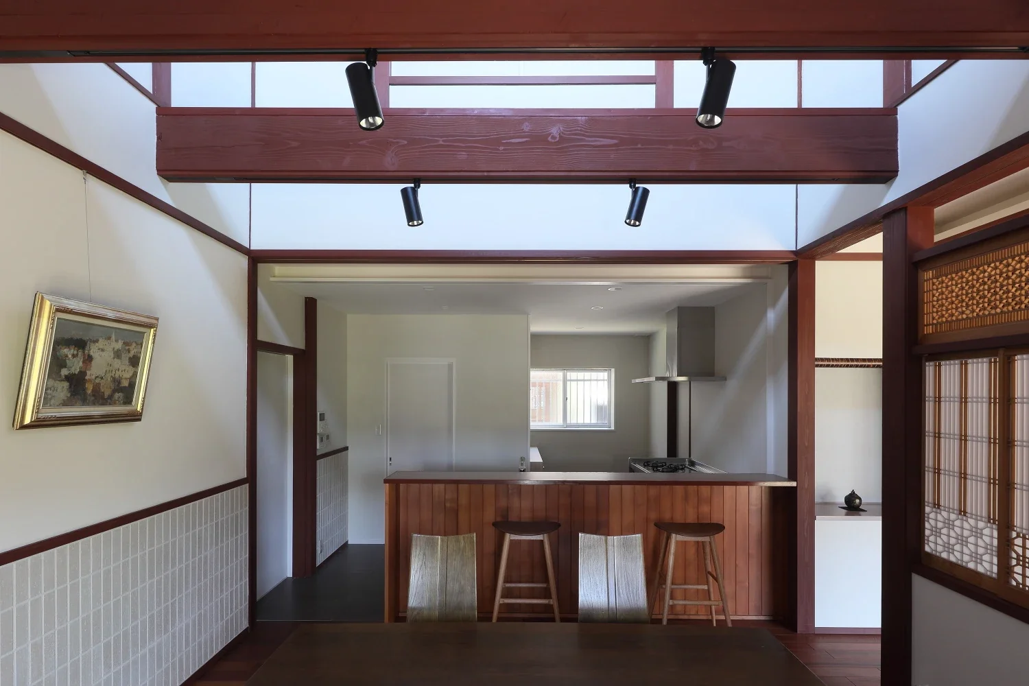 From the dining room toward the kitchen; the enclosure on the left is the pantry.