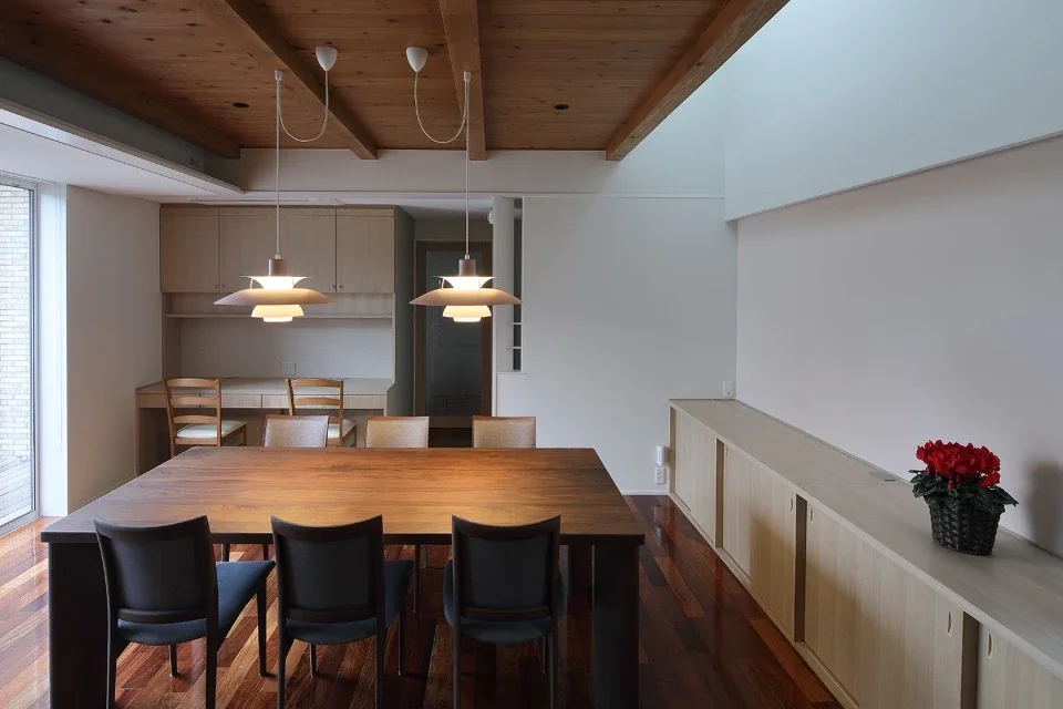 A desk corner is provided in one section of the dining room.