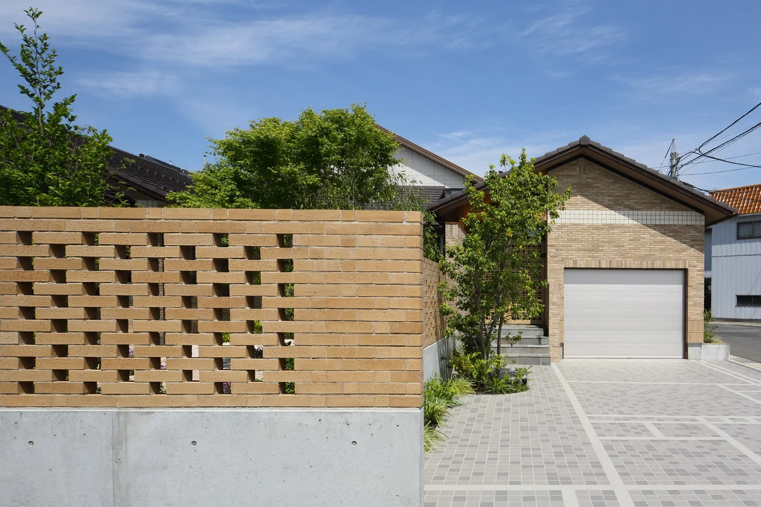 The wall enclosing the main garden is built of openwork brickwork.