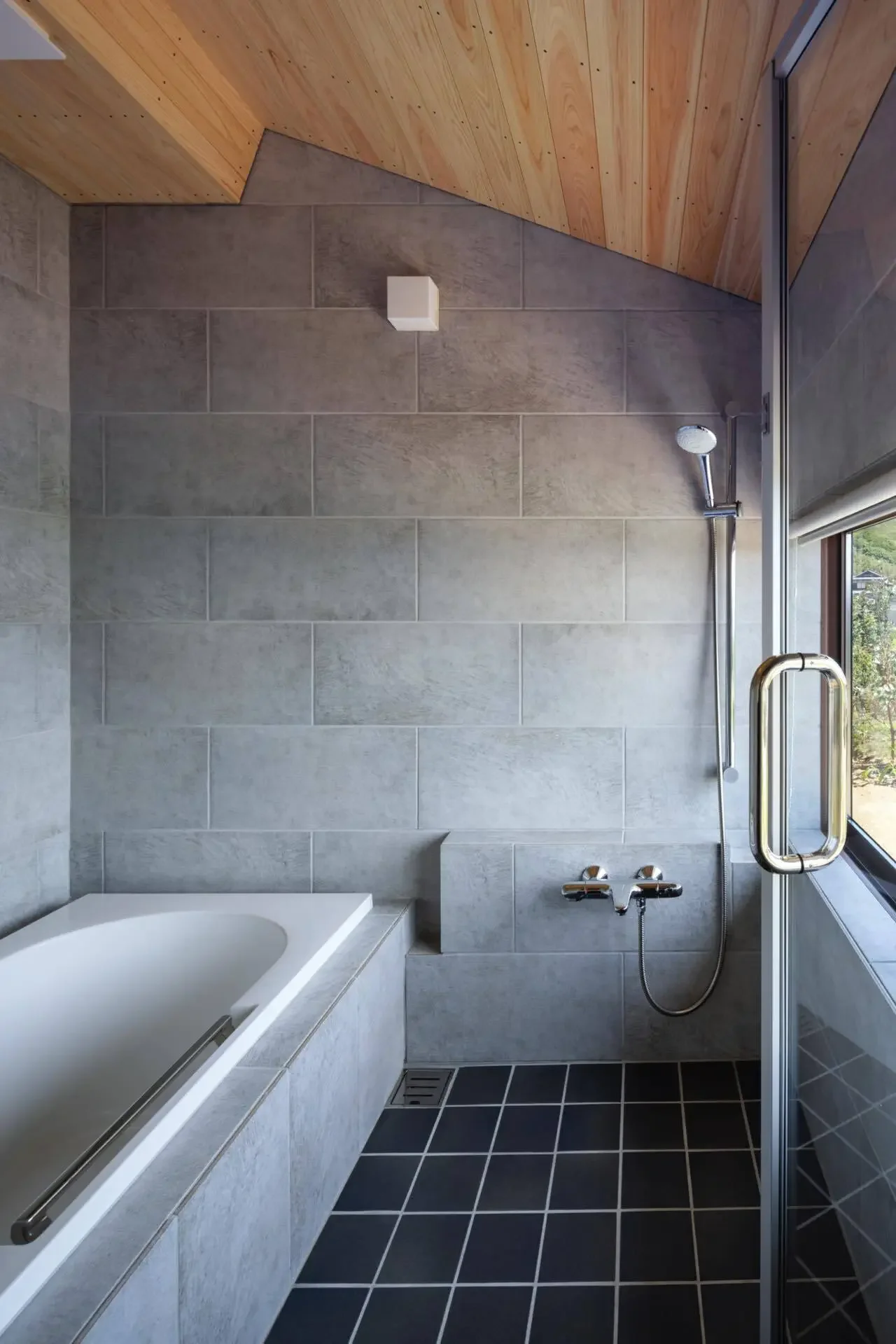A bathroom designed to enjoy the view.