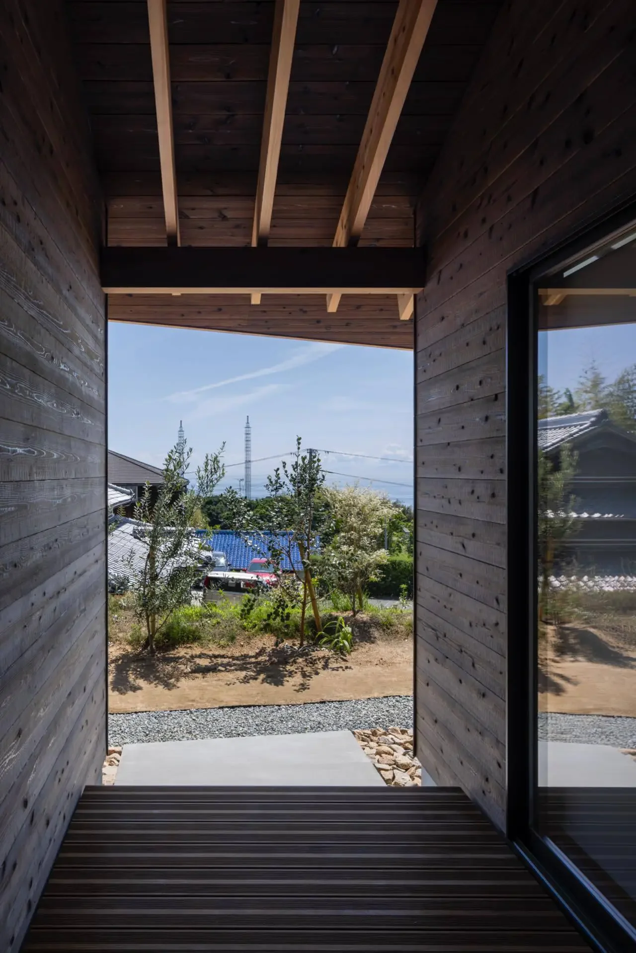 A terrace is provided between the private rooms, connecting to the outdoors.