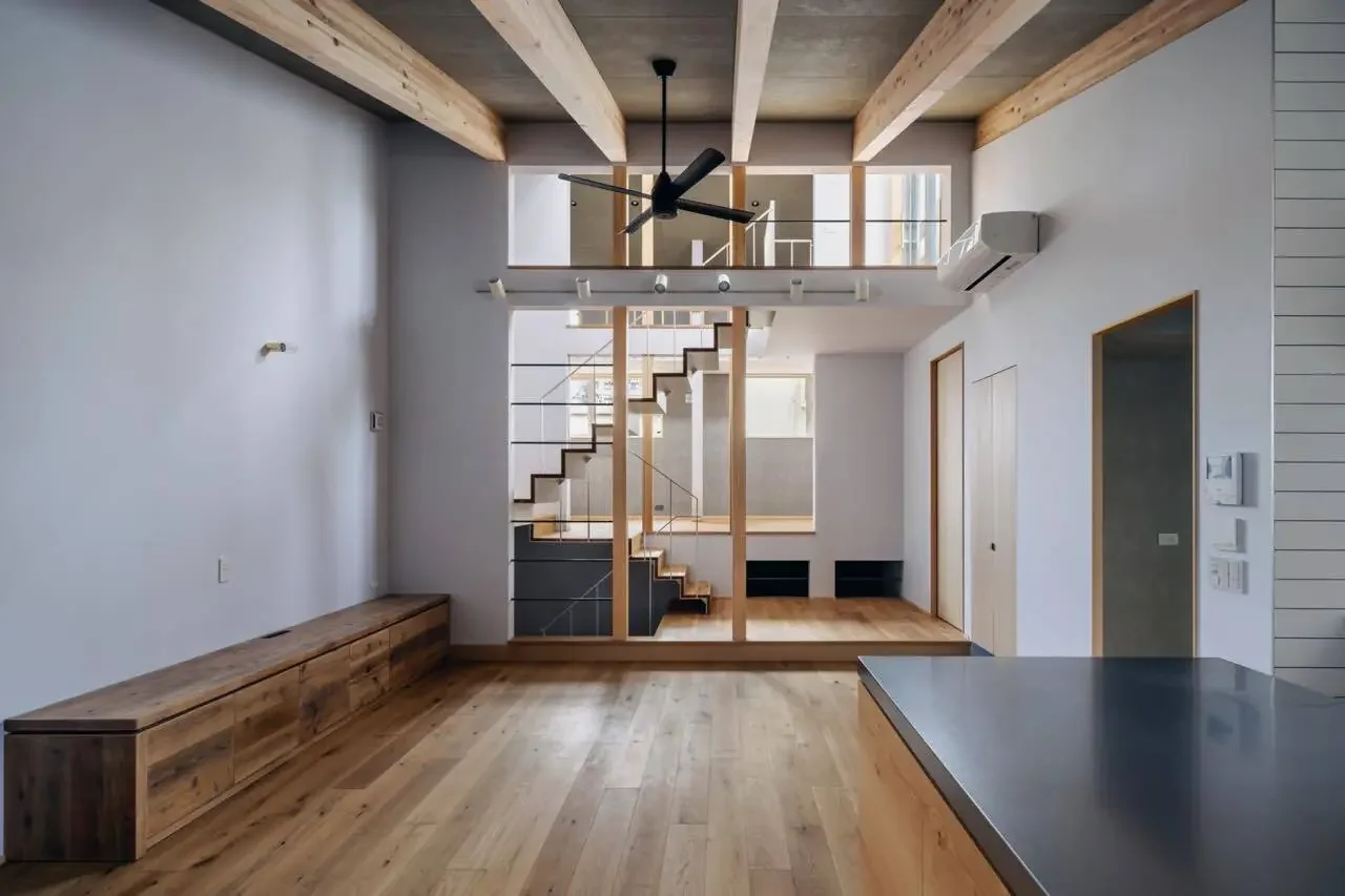Light is brought in through the central stairwell.