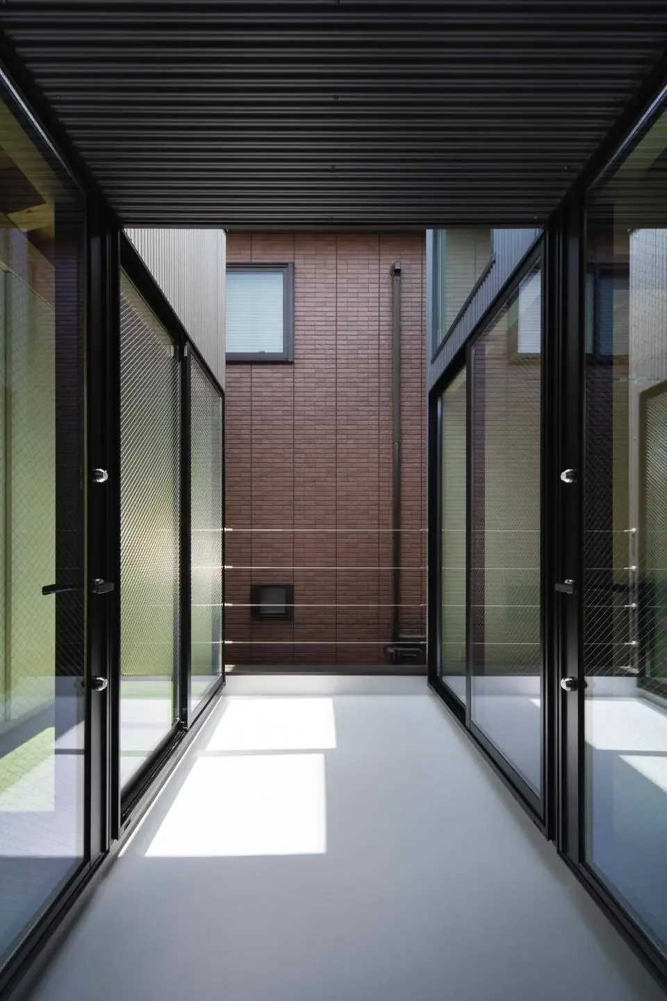 Divided into two rooms—the main house and the detached annex—on the second-floor terrace