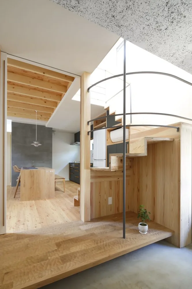 Spacious earthen-floored entrance and custom-built staircase