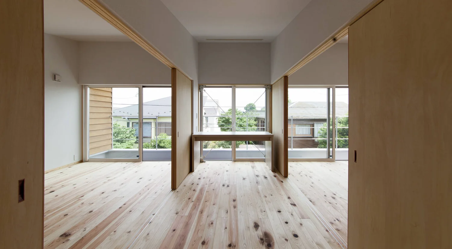 Widened corridor to second-floor private rooms forms an open space