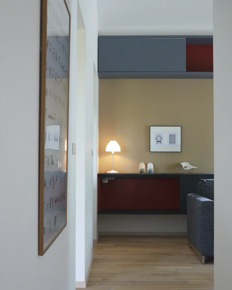 Single-story house inhabited by a chair collector