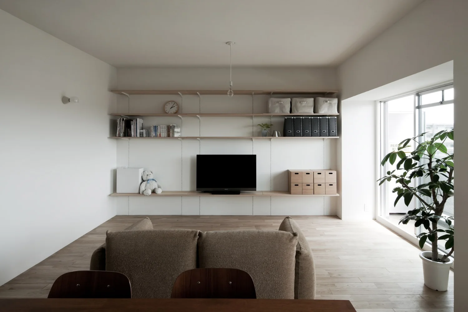 The walls incorporate embedded channel supports and structural reinforcement to bear heavy items such as a television.