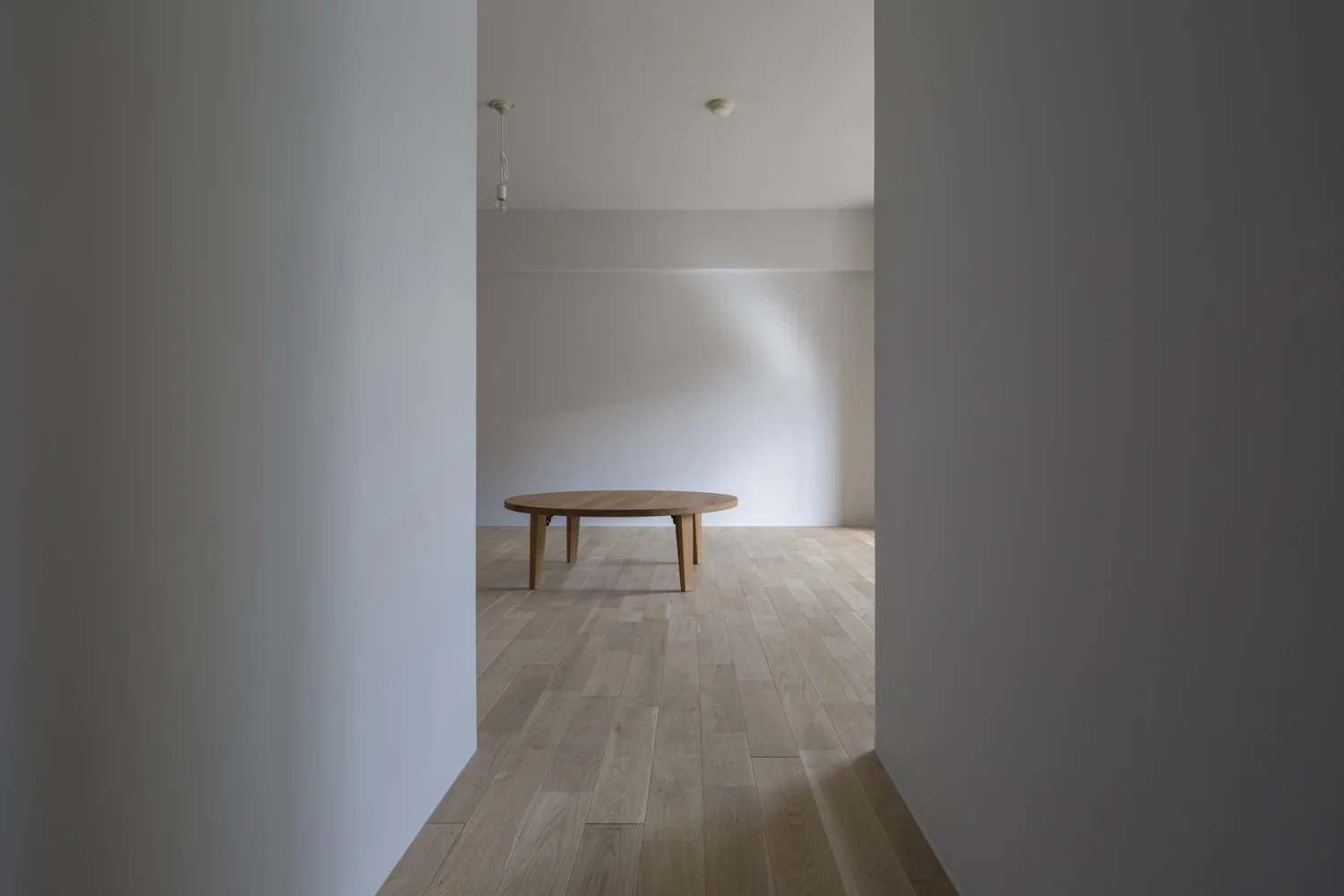 Flat with a raised seating platform and a through-passage