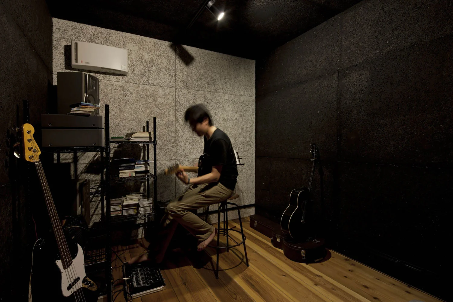 Soundproof studio. Walls and ceilings finished with painted wood-wool cement board for high acoustic performance.
