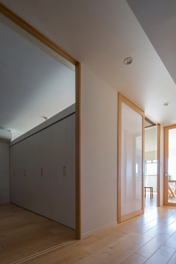 View from the corridor toward the playroom, study, and LDK.