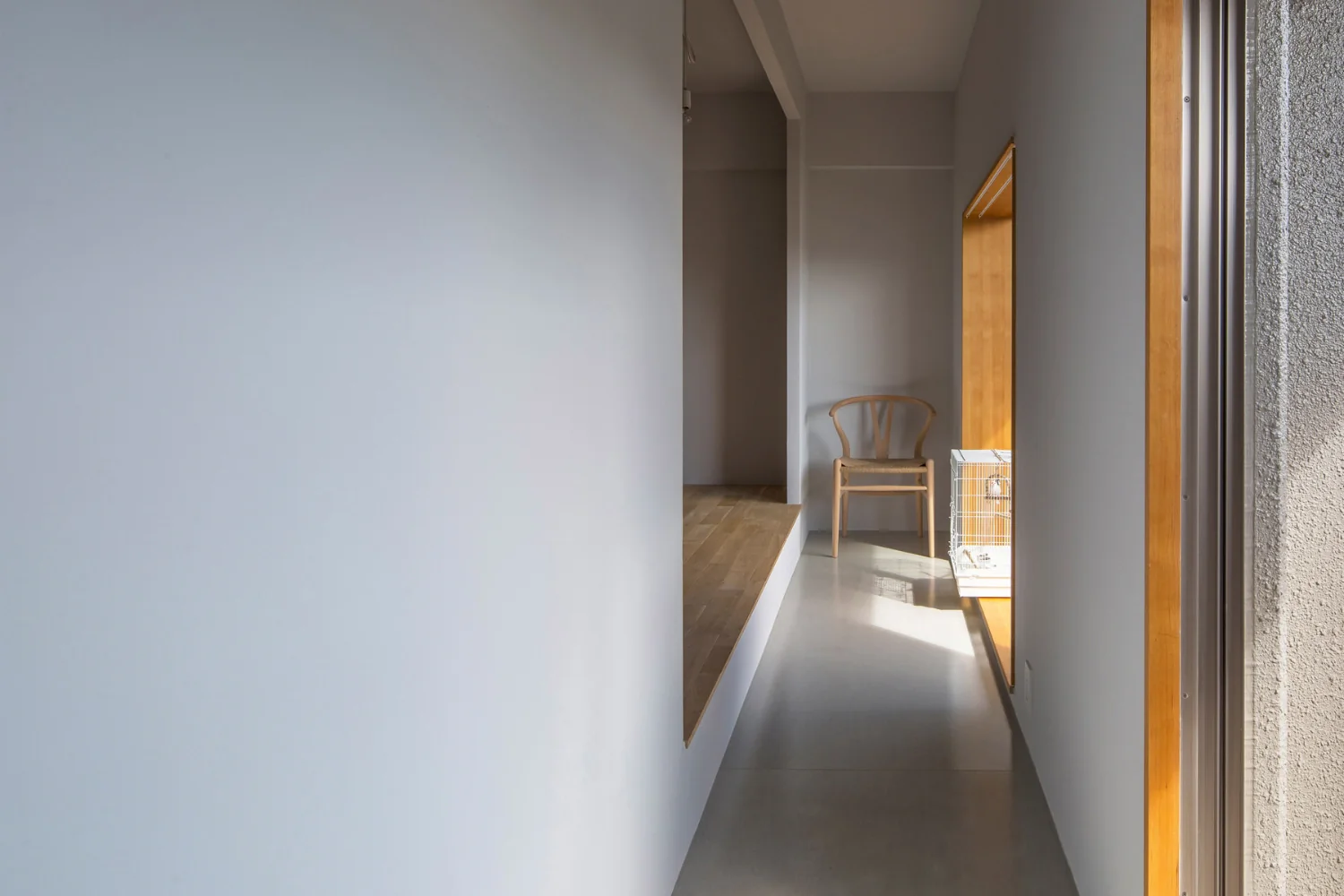 Openings conceal the window sash frames — a detail that subdues the typical condominium-like aesthetic.
