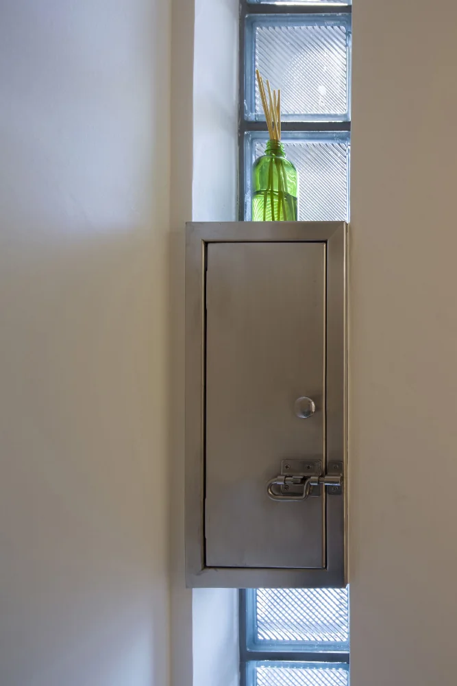 The existing retro entrance mailbox was retained and reused.