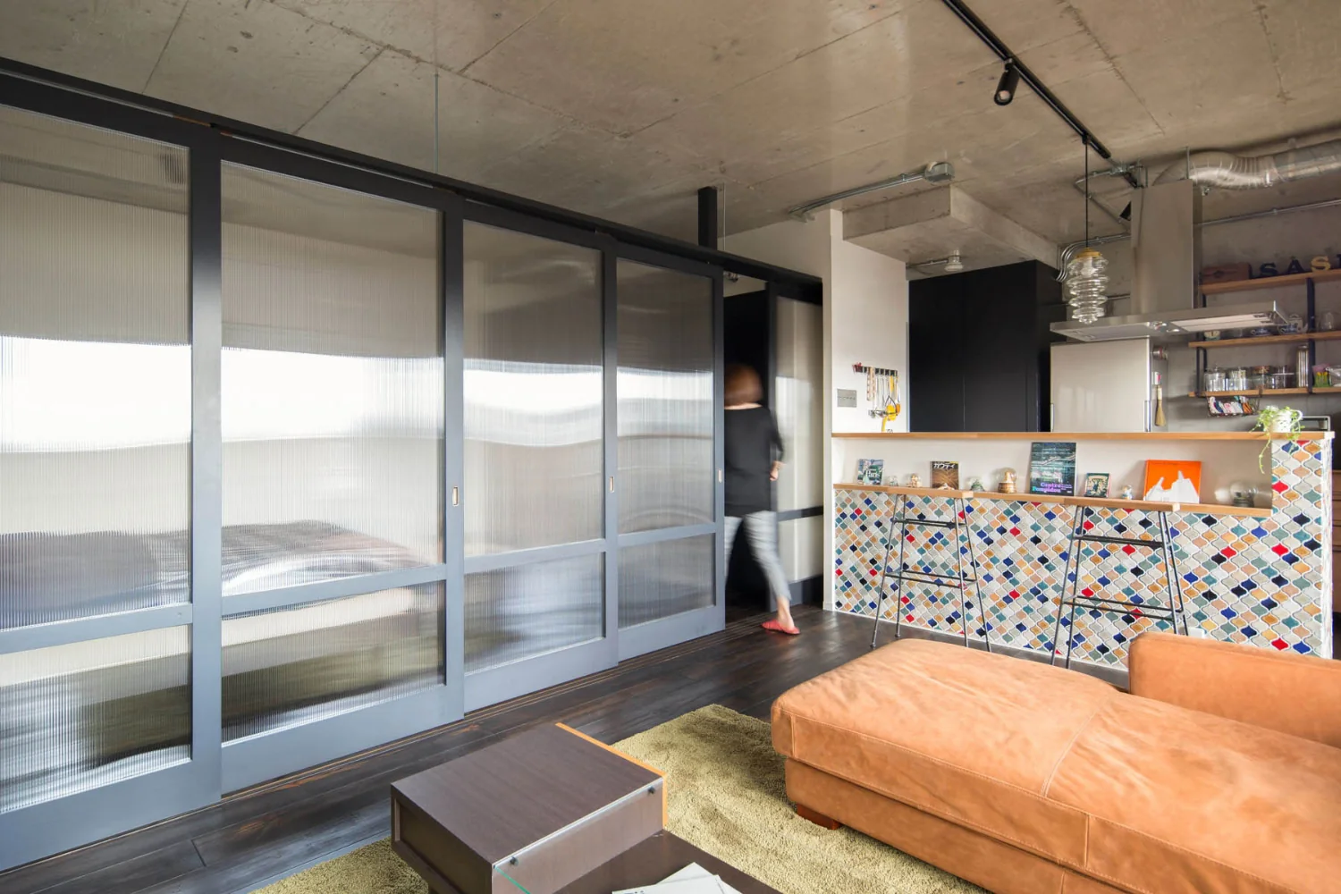 The central room is fitted with sliding doors that can be fully opened.