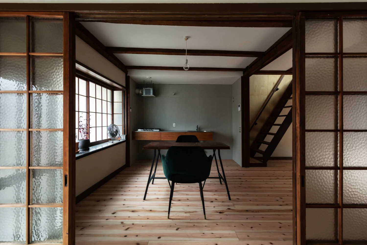 View from the entrance earthen floor toward the living room.｜Renovation Bringing Light to a Rental Row House | Row House on Showa Alley II