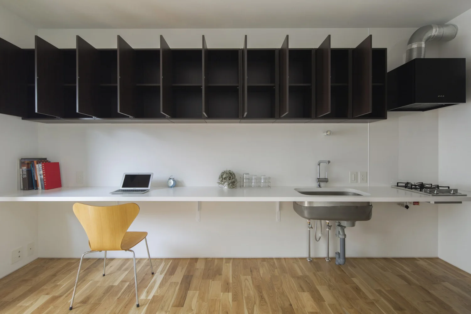 Overhead cabinets shown fully opened.
