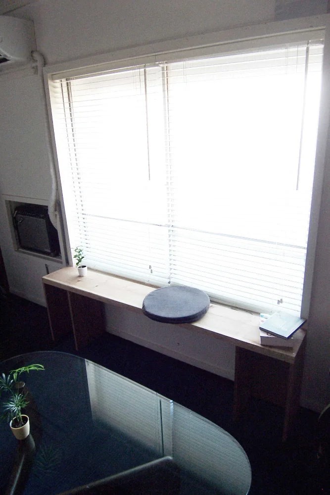 A bench fabricated using the same module as the bookshelf.