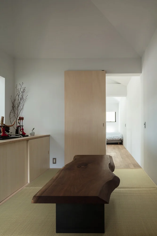 Japanese-style room. Iron legs were custom-designed to complement the client's black-walnut tabletop.