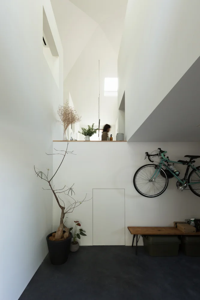 Doma-style garage. Beneath the mezzanine is a secret hideout.