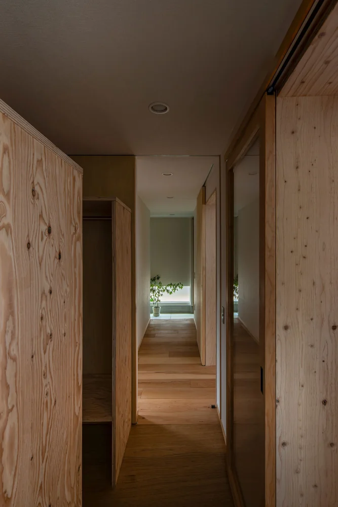 View toward the entrance from the walk-through closet.
