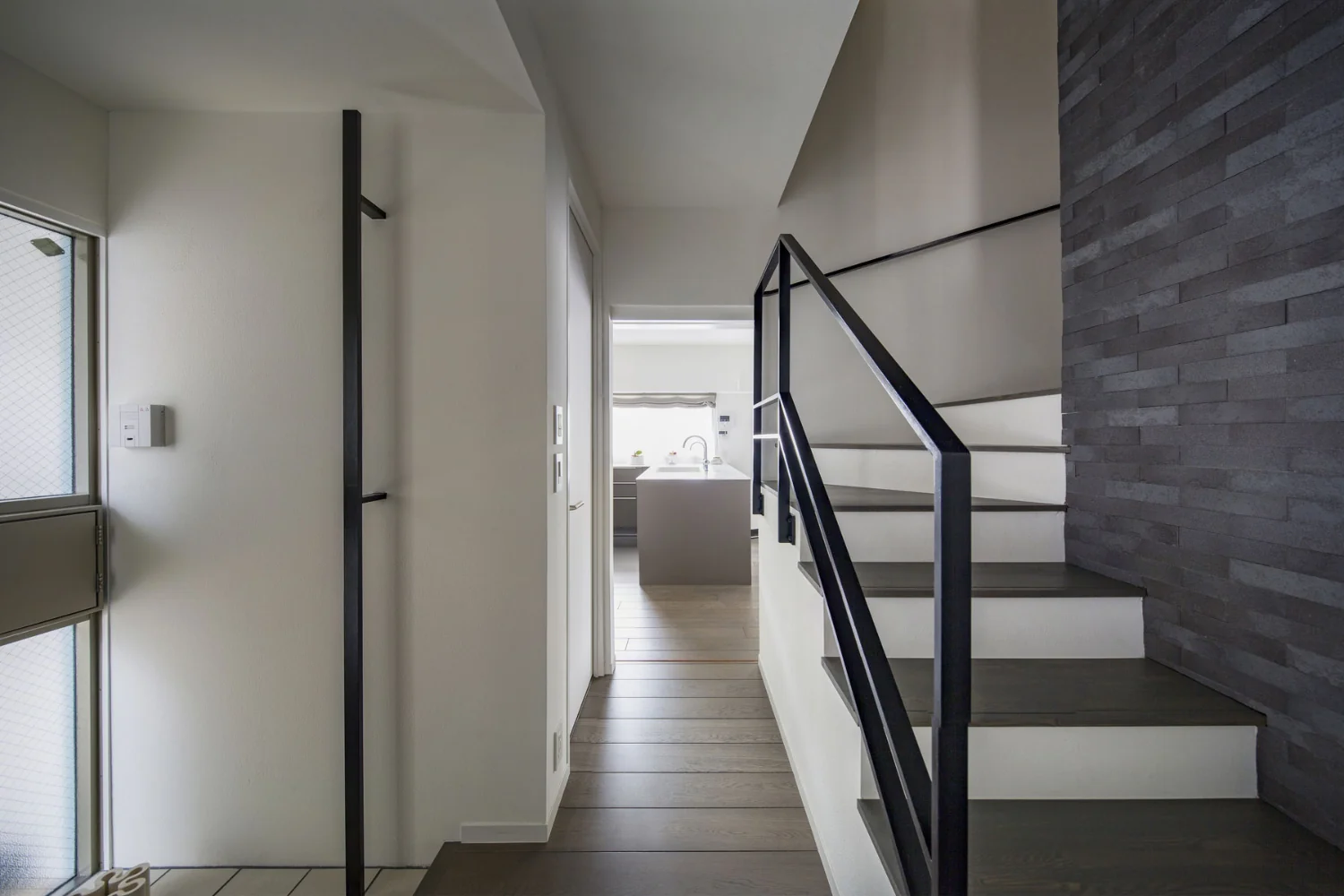 Entrance hall. Stair treads were replaced from carpet to laminated timber treads.