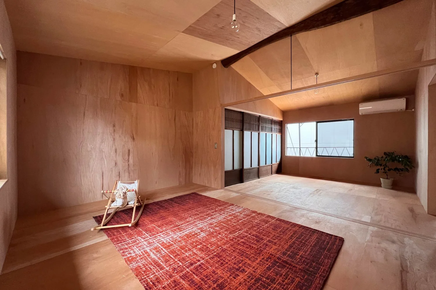 After installing insulation, the ceiling was reworked to follow the roof geometry.｜Layering a Studio Apartment and a Traditional Kyoto Townhouse — Row House III on Showa Lane