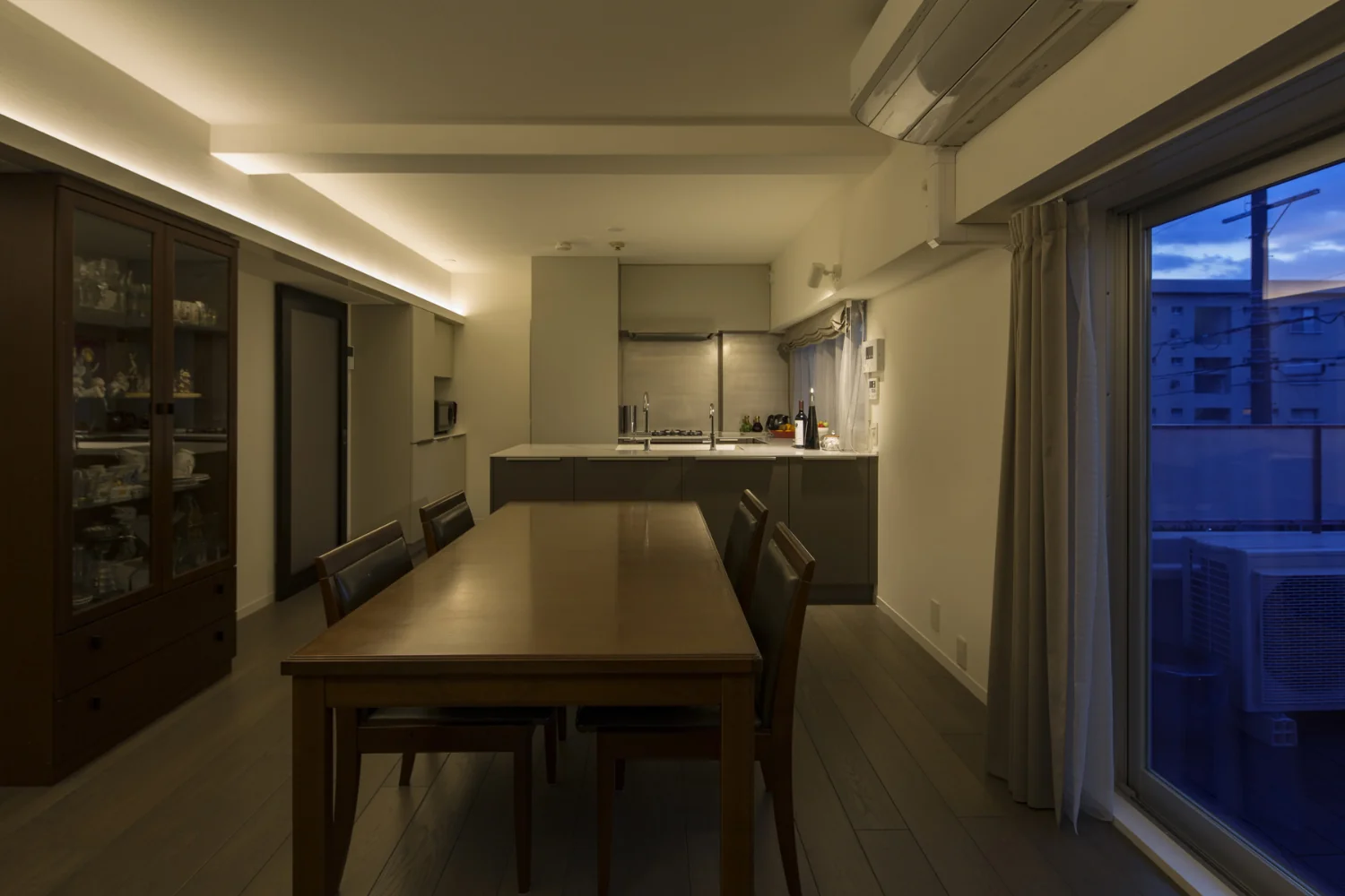 Existing furniture fits neatly beneath the indirect lighting.