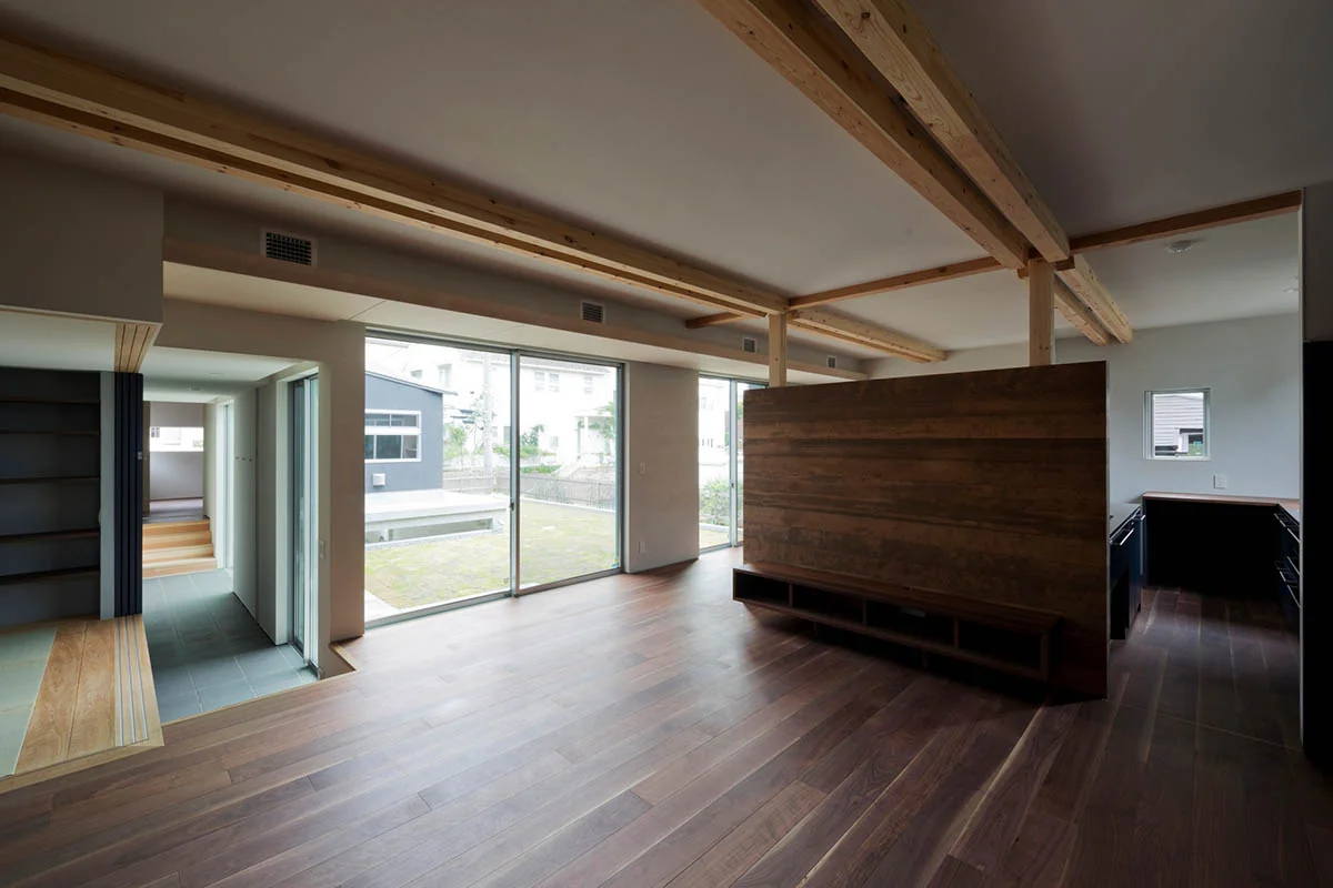 The courtyard house typology balances privacy with abundant natural lighting.