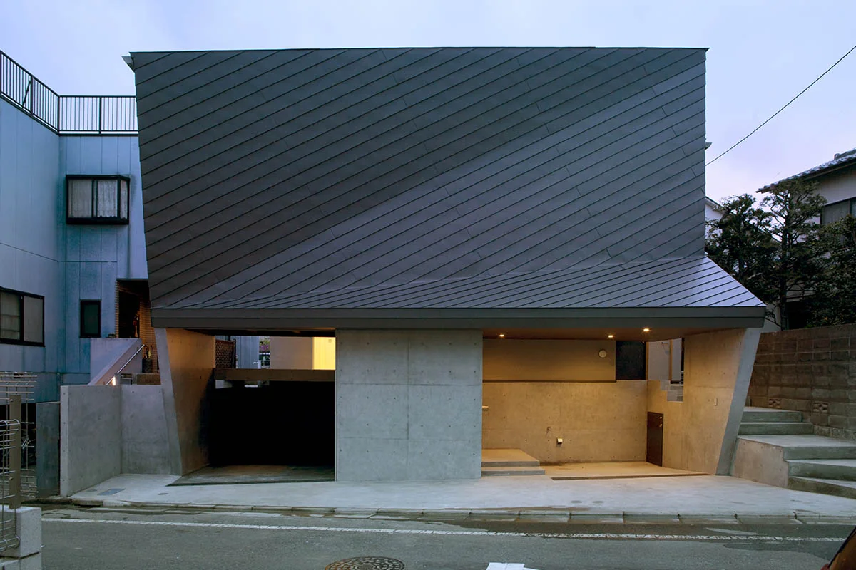 The exterior's inclined wall design fosters a conscious relationship with the building, enhancing a sense of attachment.