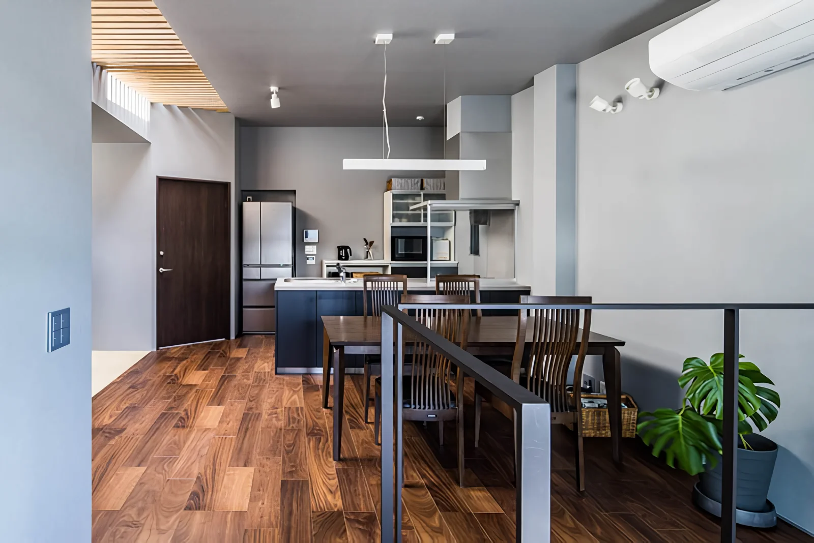 Natural light delivered from the terrace illuminates the stairwell atrium.